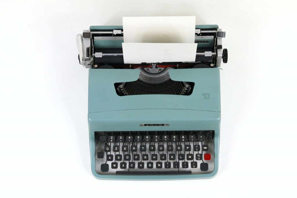 Image of a typewriter to illustrate the concept of written copy.